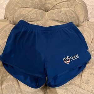 Woman’s USA lacrosse running Blue Shorts worn once. Org. $50.